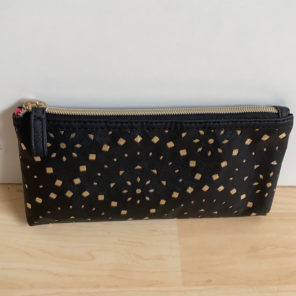 Small hand clutch new without tags